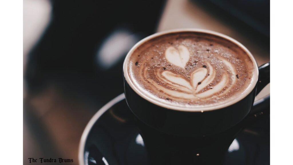 Cup of coffee nicely decorated with heart shaped whipped cream