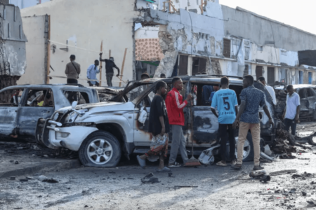 Aftermath of the Somali´s being killed by a car bomb at a cafe in Mogadishu, orchestrated by a Jihadist group, al-Shabab.