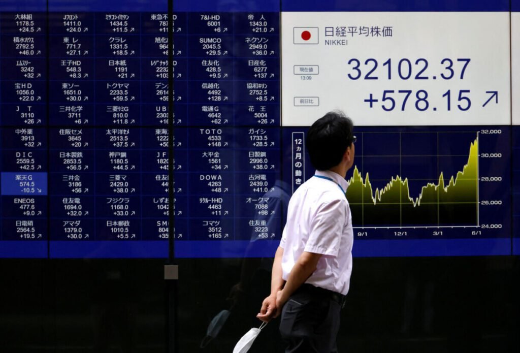 A man looking at the Japanese stocks