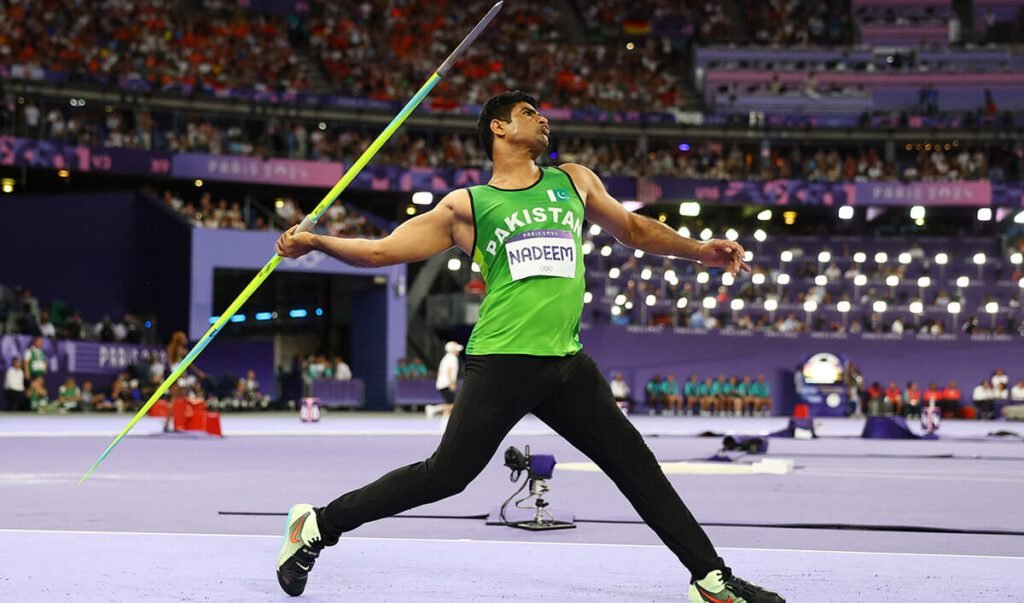 Arshad Nadeem throws javelin 92.97 meters, breaking the Olympic record and winning gold at the Paris Olympics.