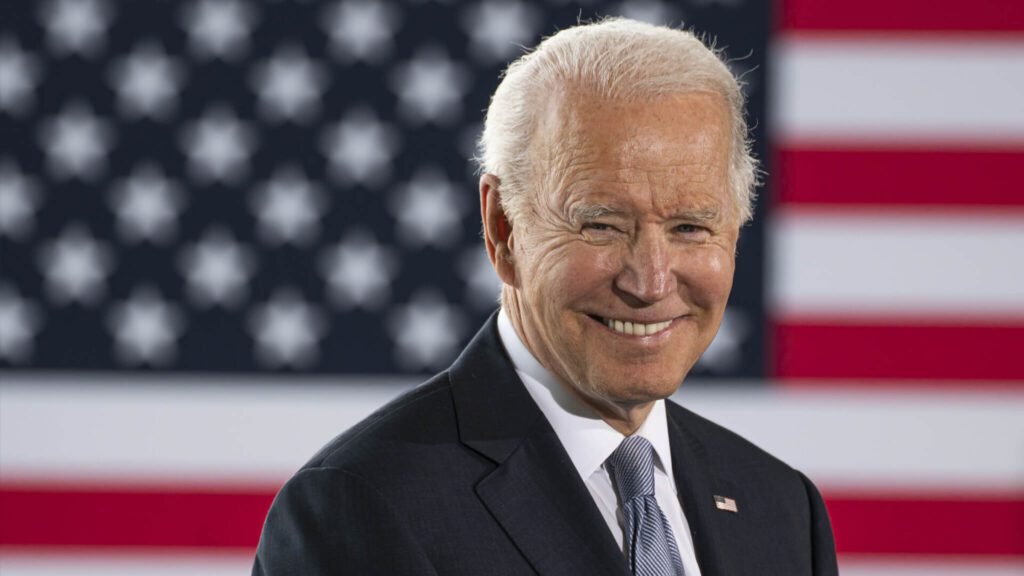 President Joe Biden in front of an American Flag