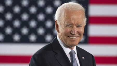 Biden Reverses Trump-Era Decision, Blocks Mining on 28 Million Acres in Alaska President Joe Biden in front of an American Flag
