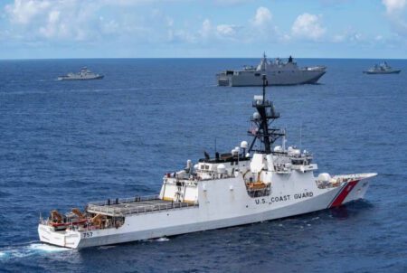 US Coast Guard Detected Russian Ship in Alaska’s Aleutian Zone Amid Growing Tensions US Coast Guard sails in formation during Rim of the Pacific