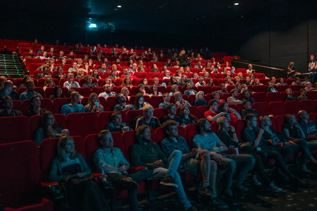 people enjoying the movies in cinema in bethel