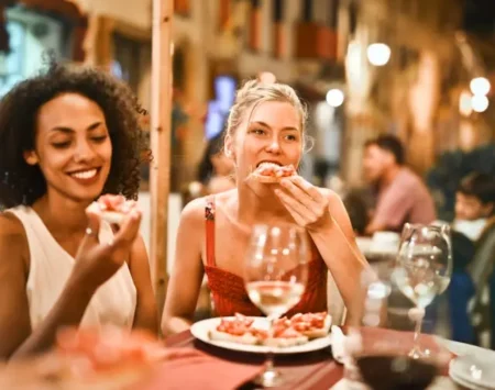 two girls enjoying food in Bethel Alaska restaurants