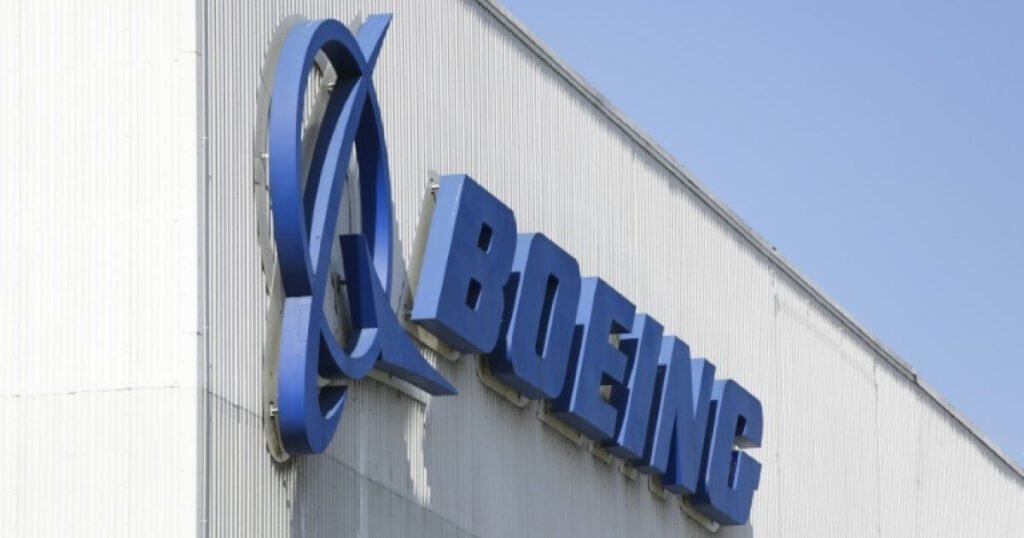 Boeing logo is prominently displayed on the side of a building.