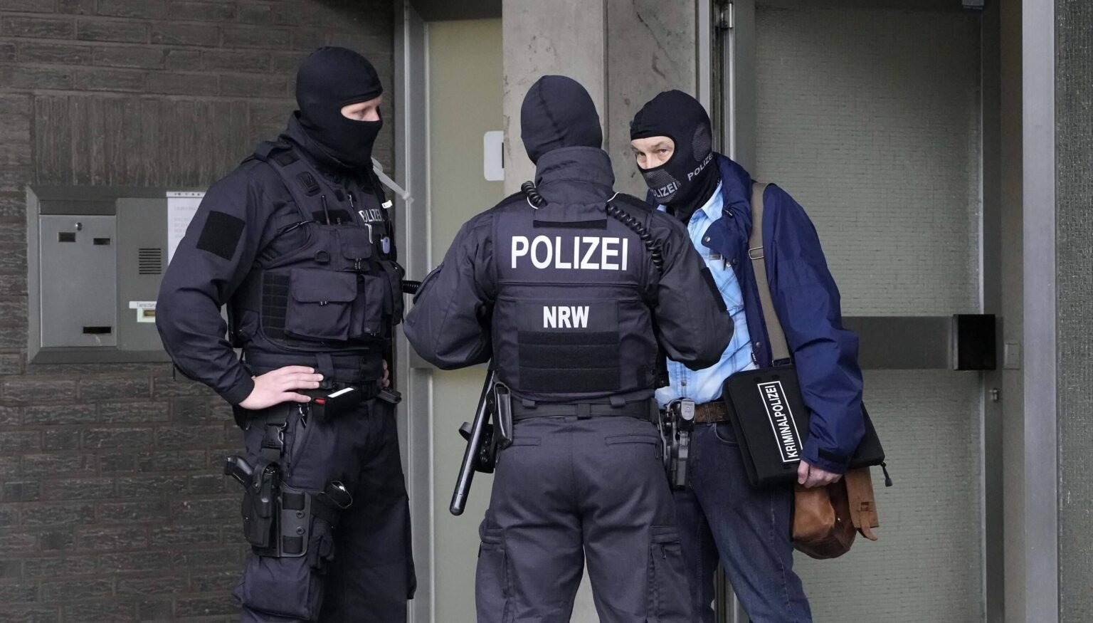 Men standing in German Police uniform