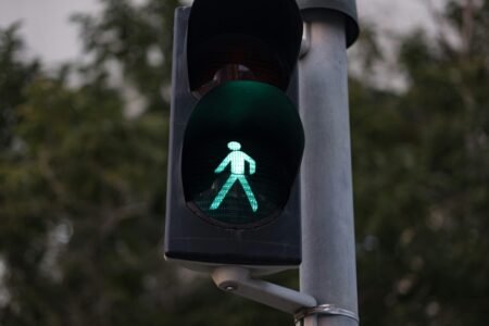 A green pedestrian signal