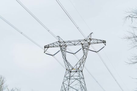 Chugach Electric Load Shedding Event Leaves Thousands Without Power in Alaska A Transmission Tower
