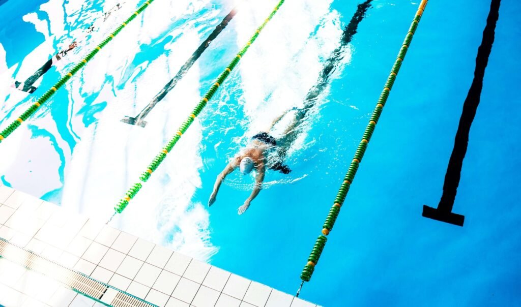 A person is swimming in the pool.