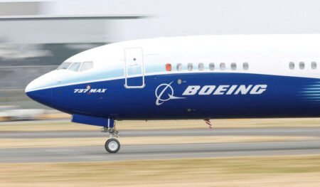 A Boeing plane on the runway.