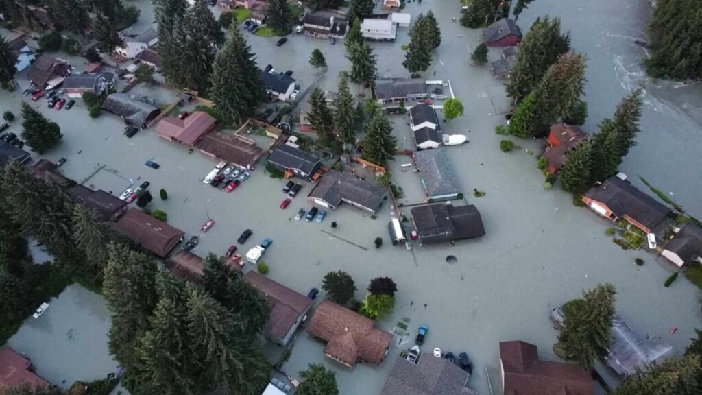 A drone image shows widespread flooding in the Mendenhall Valley.