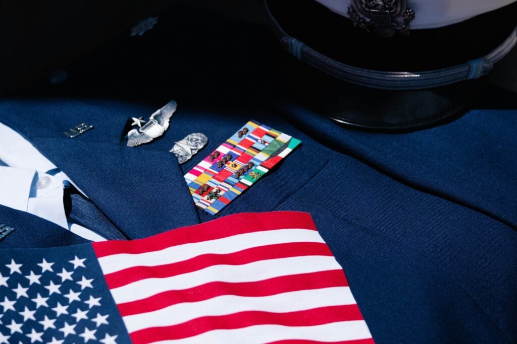 A close up of an American flag on a uniform.