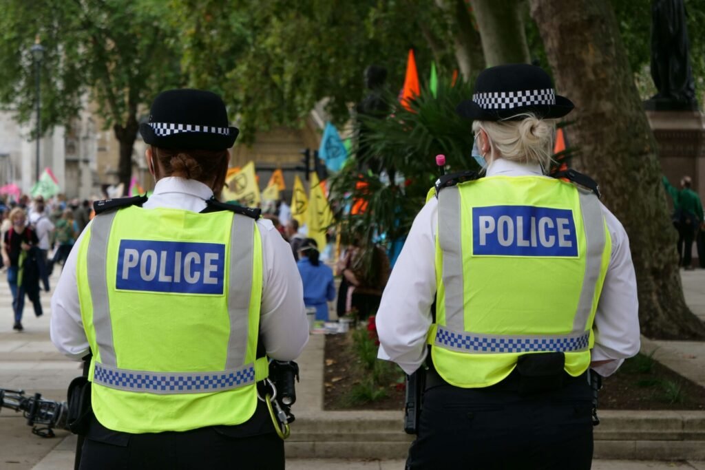 Two police officers standing together.