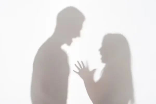 a shadow of man and woman