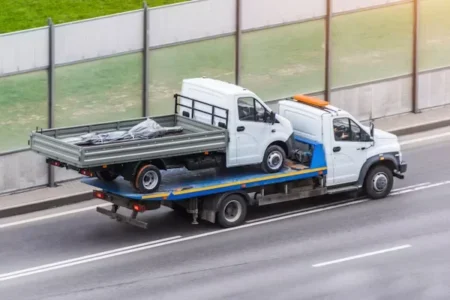 How Much Does it Cost to Tow or Recover a Car? A truck is transporting another truck