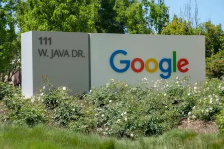 Google in front of bushes