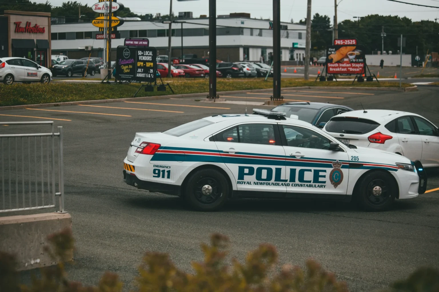 A Police car on the road.