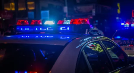 A Police car with blue and red light.