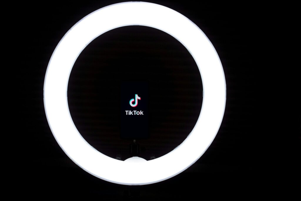 TikTok´s logo is showing inside the ring light.