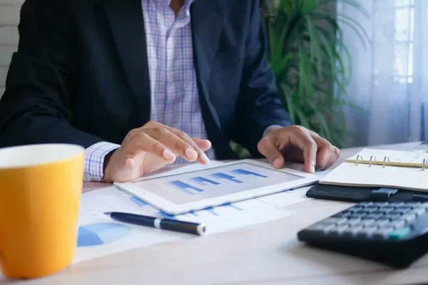 How Small Businesses Can Benefit from Flexible Business Banking Solutions a man using laptop