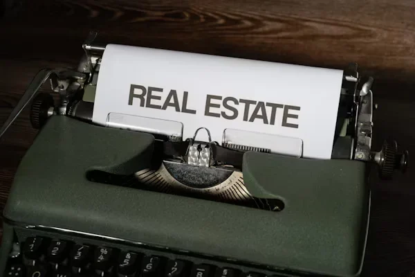 Simplifying the Home Buying Journey: How Real Estate Agents Make It Easier a typewriter