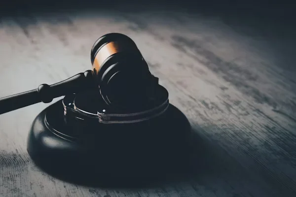 Wrongful Death Settlements: All the Losses and Damages that are Included a judge gaven on wooden table