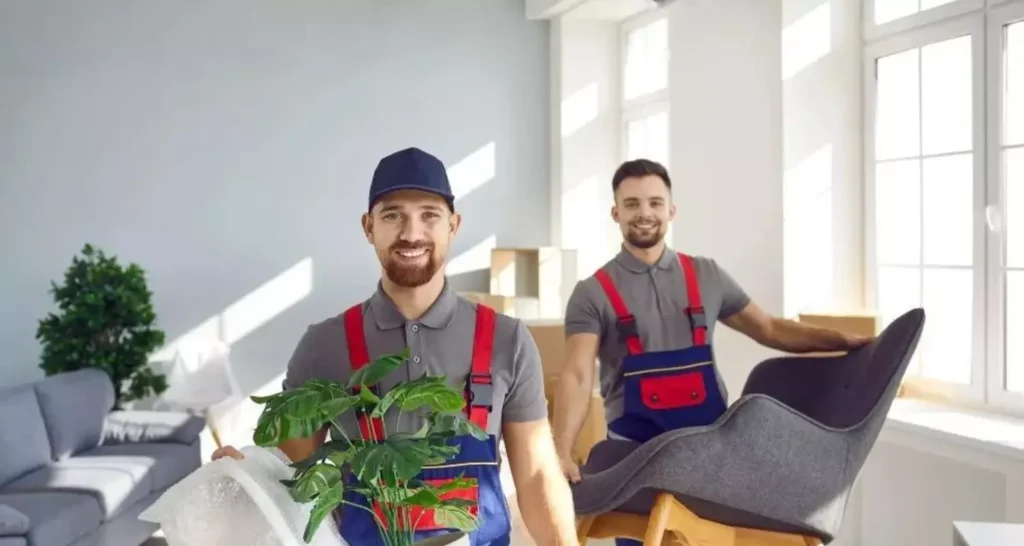 Moving to Alaska Made Simple with Local Insights and Practical Tips two men holding furniture