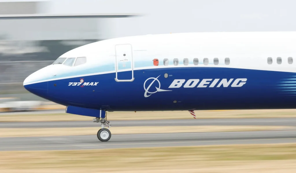 A side view of Boeing 737 Max on the runway.