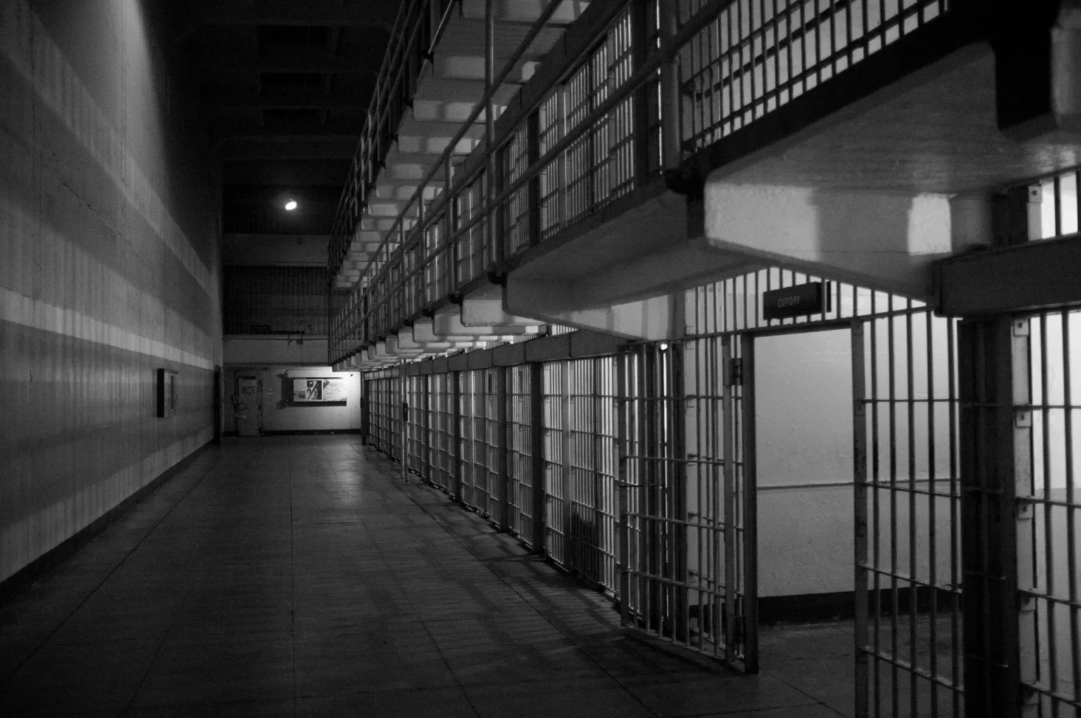 Inmate Dies in Anchorage Jail Attack Amid Concerns Over Mental Health A prison with multiple cells.