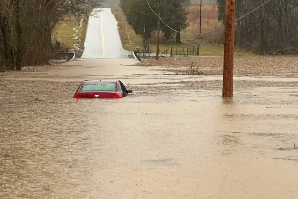 A car submerged in water due to the Kentucky flash flood.