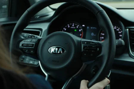 Indian Kia Motors Tax Dispute Draws Scrutiny Over Customs Practices A steering wheel with Kia written on it.