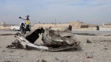 White Helmets volunteers working at the site of the bombing.