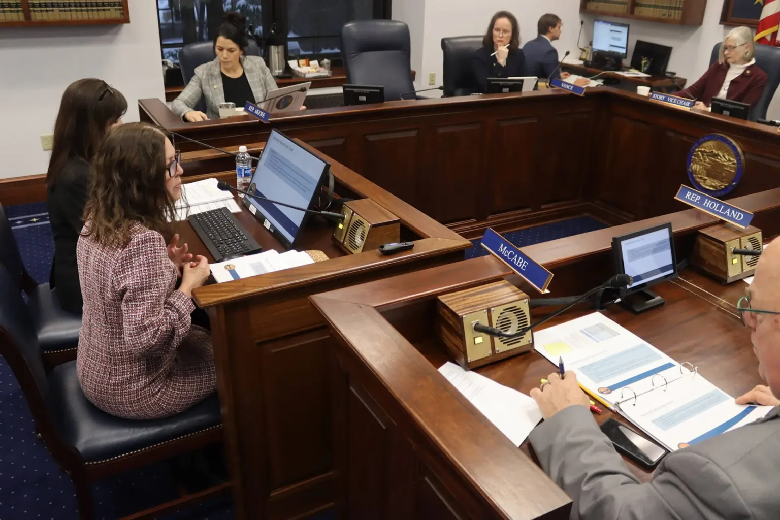 Anchorage Salary Study Delay Frustrates Lawmakers Amid Staffing Crisis Alaska lawmakers are gathered for a meeting due to a salary study delay.