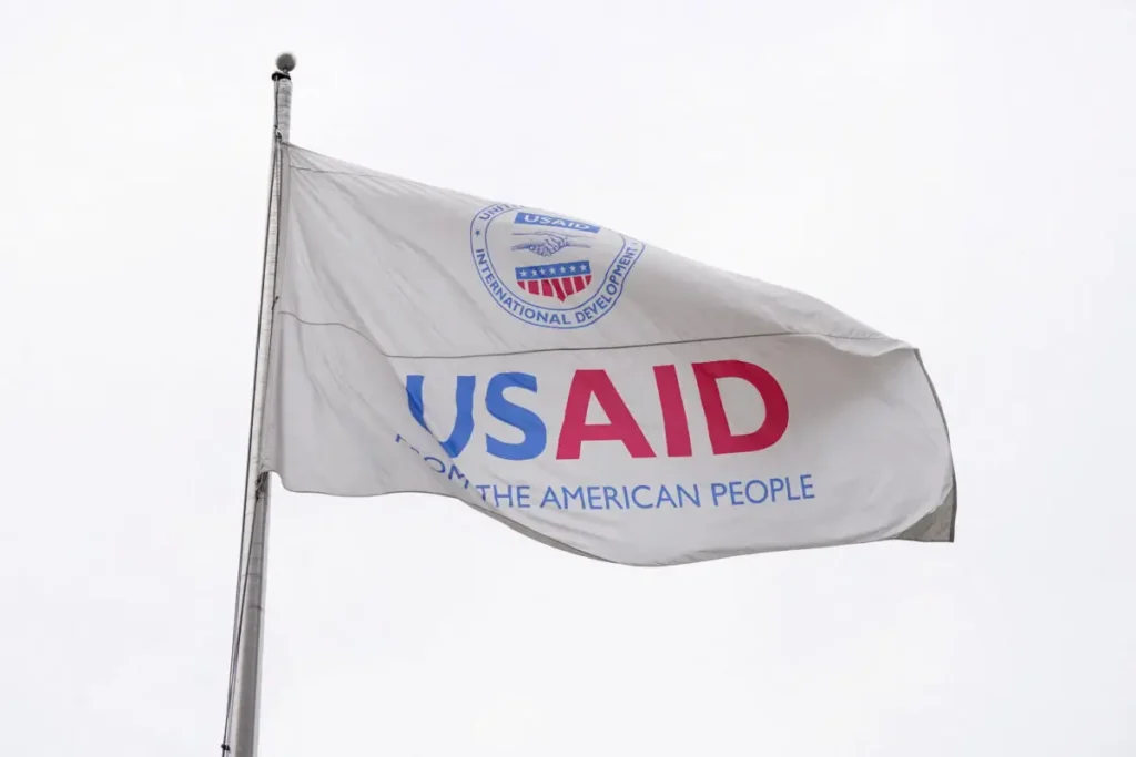 A flag with USAID written on it.