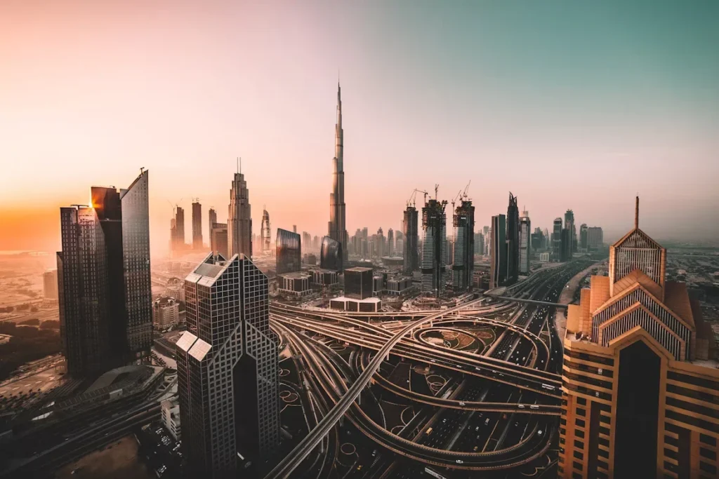 aerial view of city highway surrounded by buildings