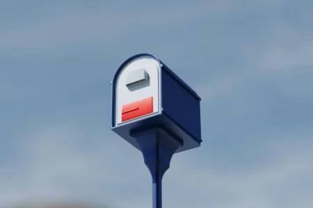 Alaska Lawmakers Raise Concern Over Threats to Bypass Mail Program A blue mailbox.