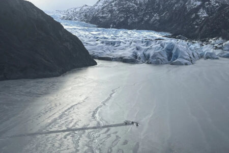 FAA Investigates Alaska Student Pilot Accident After Lake Crash An airplane stuck in the snow.