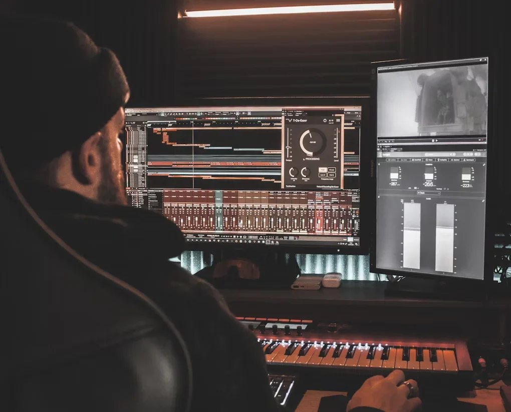 The Future of Music Creation: Exploring AI Music Generators a man in black jacket playing piano