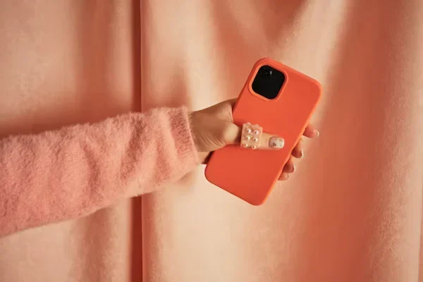 a woman holding iphone