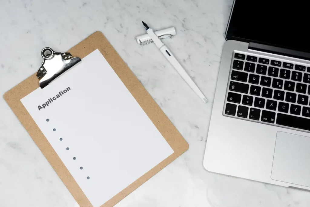 white paper on brown folder