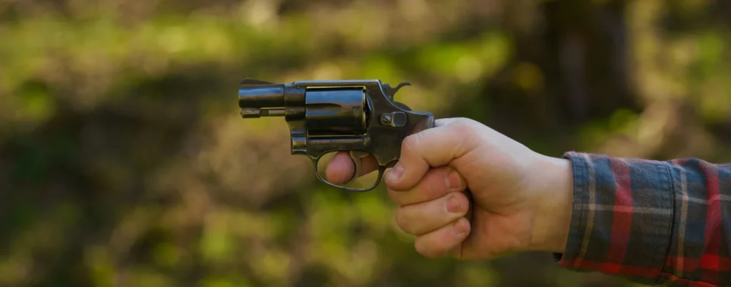 A person holding a gun.