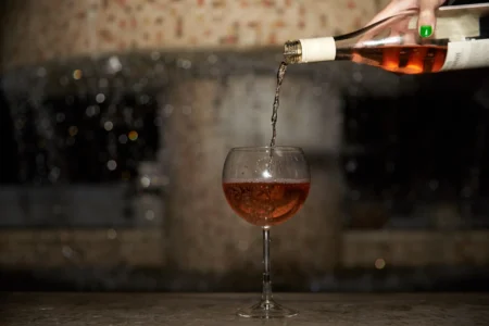 Alcohol being poured in a glass.