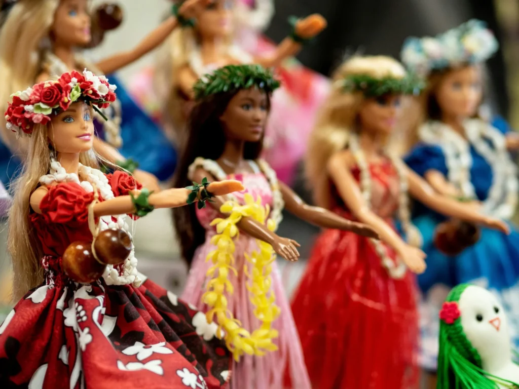 Various versions of Barbie dolls.