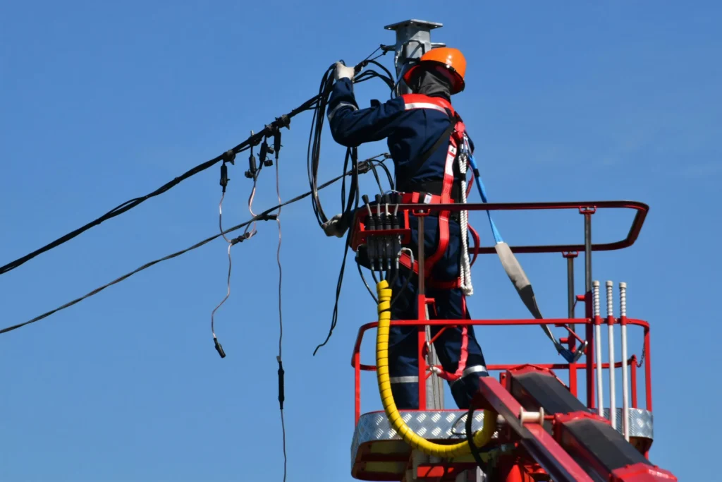 A man fixing the electricity.