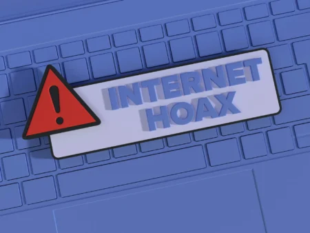 A keyboard with a warning sign on it.