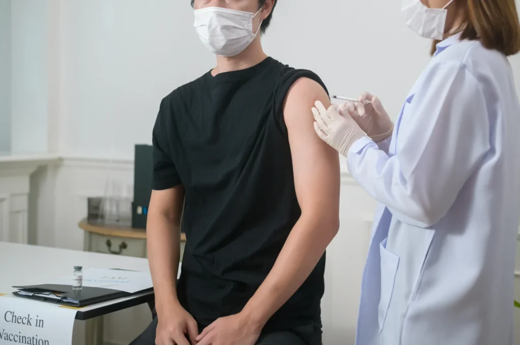 A man getting vaccinated.