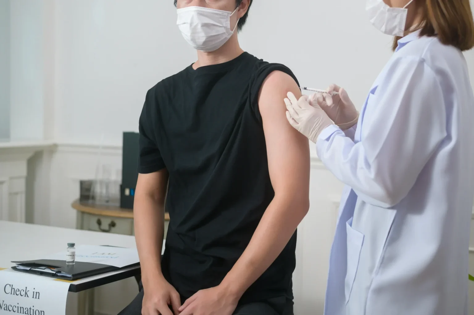 A man getting vaccinated.