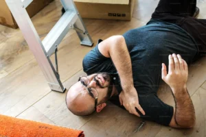A man laying on ground