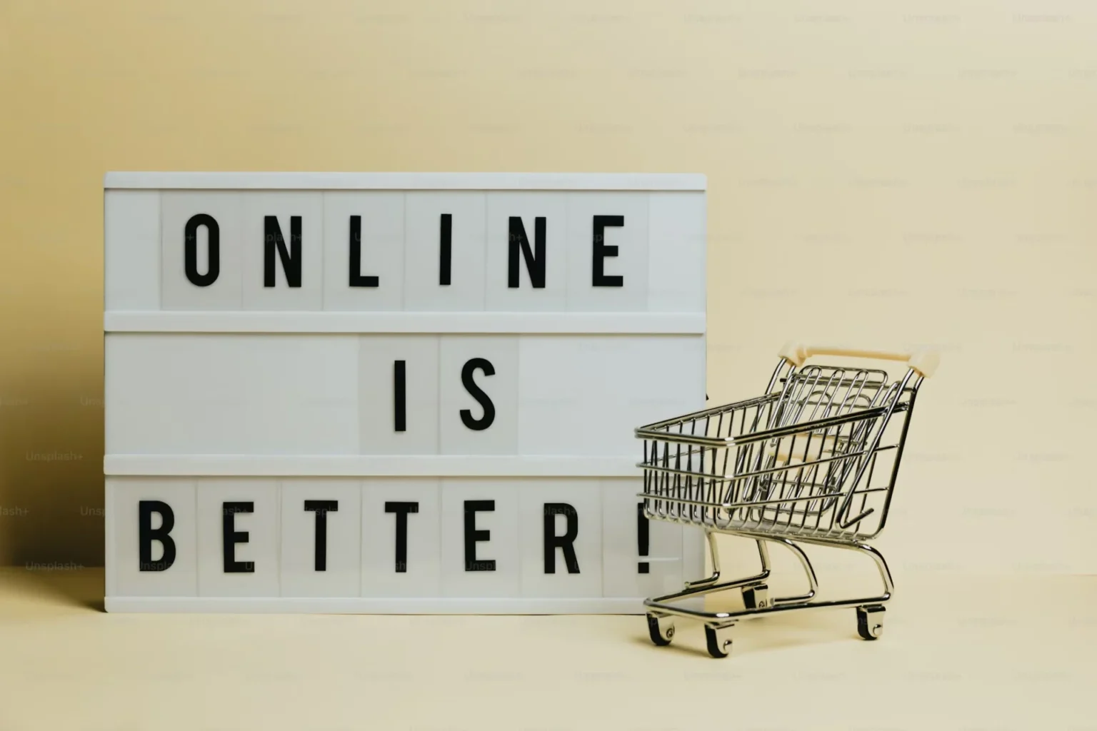 Top Tips for Saving Money While Shopping Online a shopping cart next to a sign that says online is better